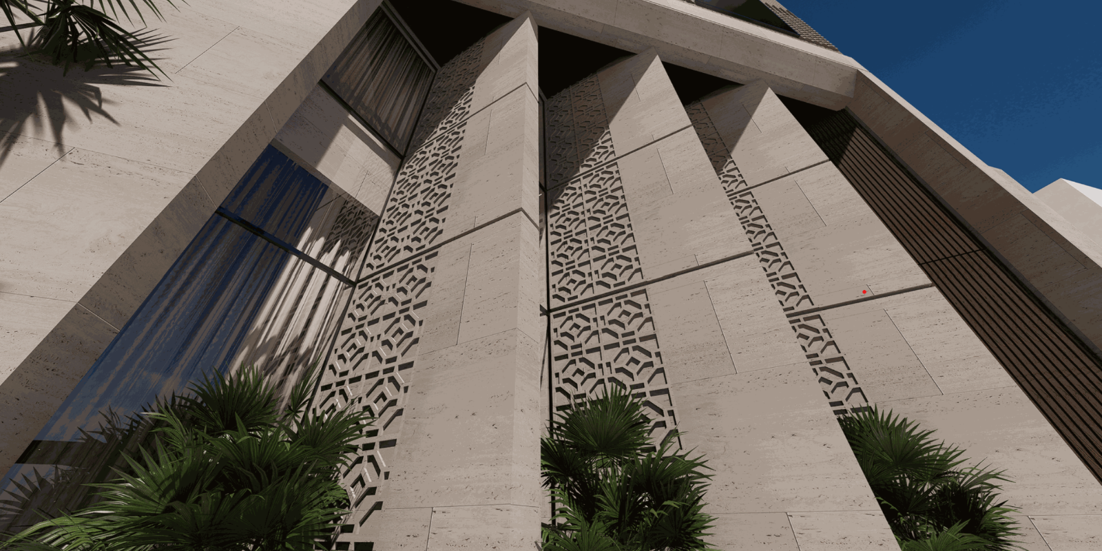 Tall building with decorative patterns on the facade, surrounded by palm trees.