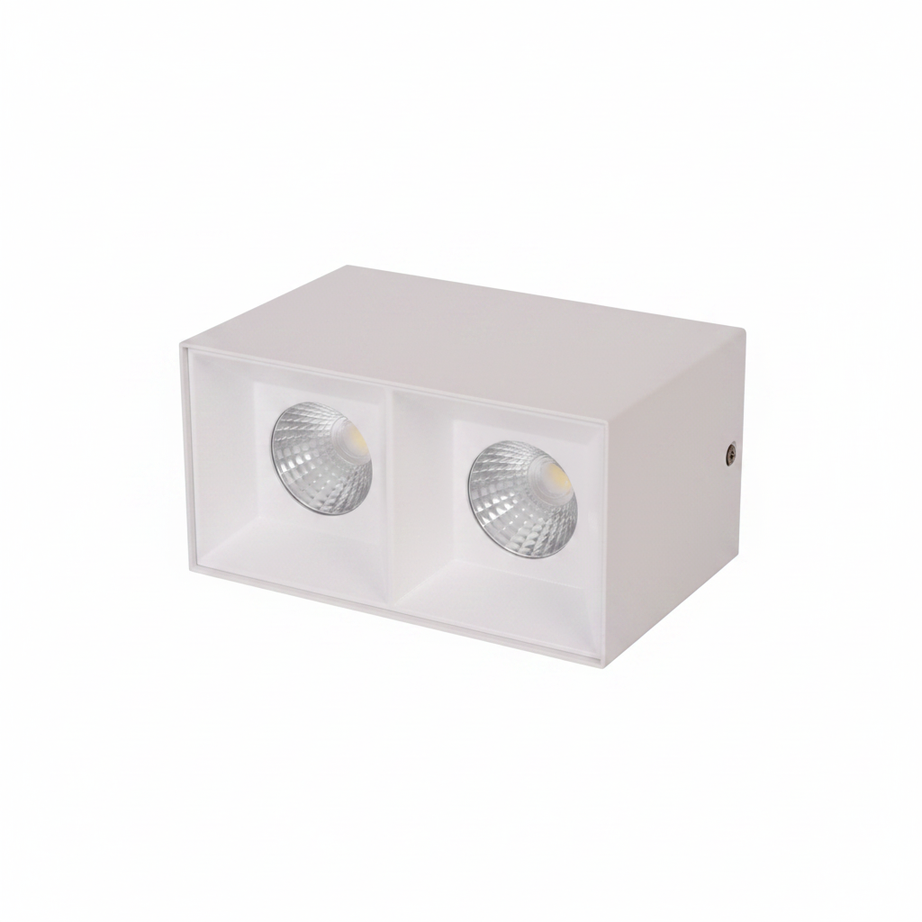 White rectangular box with two circular holes on a white background